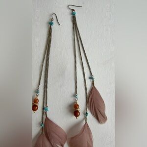 Very long feather earrings
